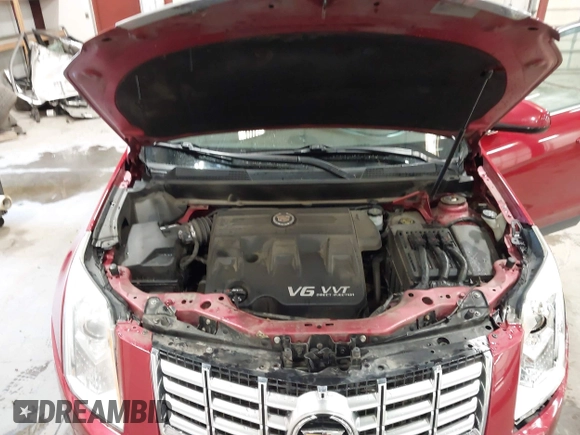 2016 Cadillac SRX Performance Collection z VIN 3GYFNCE32GS571230, wystawiony jako IAAI lot #42417263 z przebiegiem 59 634 mil mil oraz . Historia ofert i sprzedaży dostępna na DreamBid. Obrazek 10.