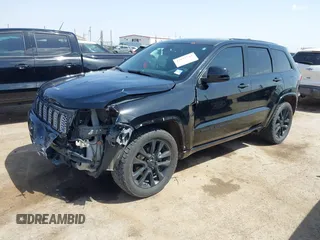 2017 Jeep Grand Cherokee Altitude with VIN 1C4RJEAG2HC816473, listed as a IAAI auction lot 42071543 with 171,096 mi miles and . Bid and sale history available at DreamBid. Image 2.