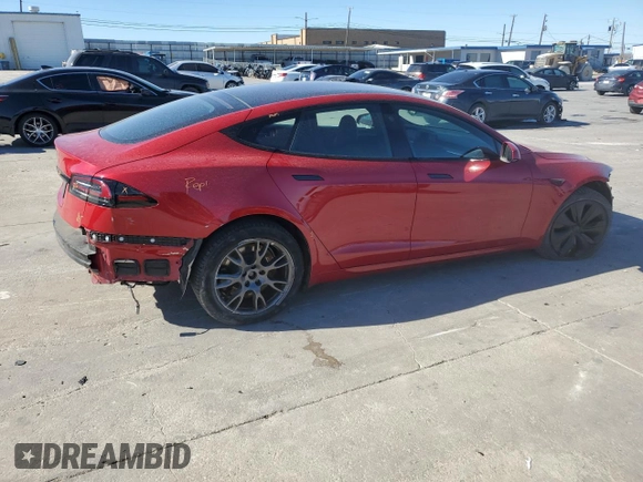 2022 Tesla Model S with VIN 5YJSA1E57NF478036, listed as a Copart auction lot 42147205 with 44,576 mi miles and Salvage title. Bid and sale history available at DreamBid. Image 3.