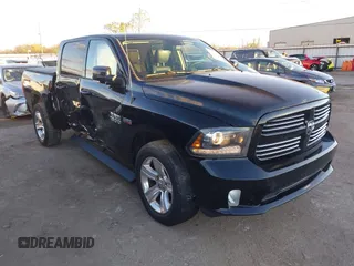 2014 Ram 1500 Sport z VIN 1C6RR6MT8ES204200, wystawiony jako IAAI lot #40858442 z przebiegiem 126 600 mil mil oraz . Historia ofert i sprzedaży dostępna na DreamBid. Obrazek 1.