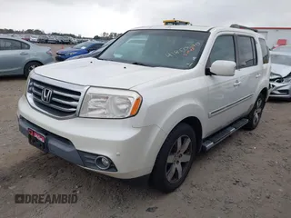 2012 Honda Pilot Touring with VIN 5FNYF4H92CB063229, listed as a IAAI auction lot 41850020 with 205,826 mi miles. Bid and sale history available at carsss.com. Image 17.