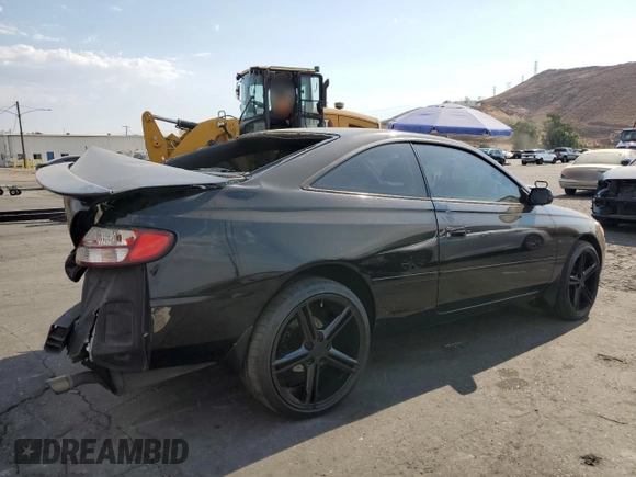 2000 Toyota Solara SE with VIN 2T1CF28P0YC337293, listed as a Copart auction lot 70659044 with 214,172 mi miles and Salvage Title. Bid and sale history available at DreamBid. Image 3.