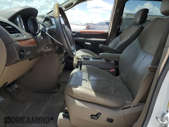 2015 Chrysler Town & Country Limited Platinum with VIN 2C4RC1GG0FR584244, listed as a Copart auction lot 67665184 with 188,999 mi miles and Salvage Title. Bid and sale history available at DreamBid. Image 7.