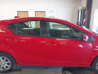 2015 Toyota Prius c One with VIN JTDKDTB3XF1108456, listed as a IAAI auction lot 41743379 with 132,265 mi miles. Bid and sale history available at carsss.com. Image 13.