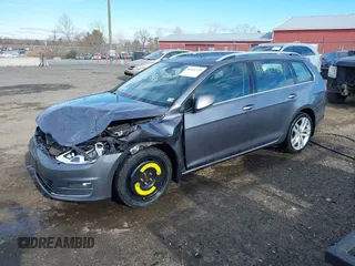 2015 Volkswagen Golf SportWagen TDI SE with VIN 3VWCA7AU7FM506948, listed as a IAAI auction lot 41021723 with 182,093 mi miles. Bid and sale history available at carsss.com. Image 2.
