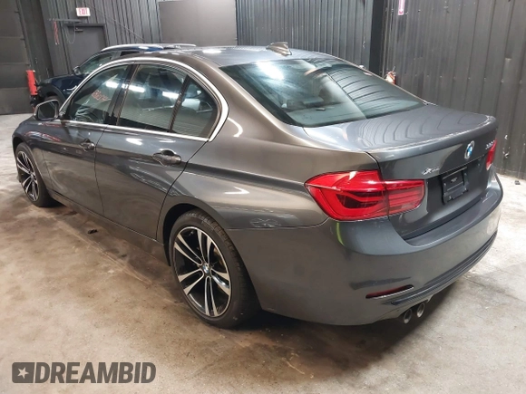 2018 BMW 3 Series 330i xDrive with VIN WBA8D9C51JEM34061, listed as a IAAI auction lot 42682318 with 65,245 mi miles and . Bid and sale history available at DreamBid. Image 3.