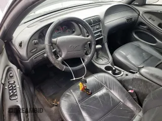 2000 Ford Mustang with VIN 1FAFP444XYF251973, listed as a Copart auction lot 58192815 with 114,531 mi miles and Salvage title. Bid and sale history available at DreamBid. Image 8.