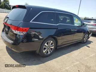 2014 Honda Odyssey Touring с VIN 5FNRL5H91EB013332, выставлен на аукционе Copart как лот 59414015 с пробегом 162 203 миль миль и Списание • Salvage title. История ставок и продаж доступна на DreamBid. Изображение 3.