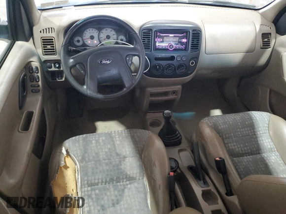 2002 Ford Escape XLS Value with VIN 1FMYU01B32KC48043, listed as a Copart auction lot 63011005 with 167,185 mi miles and Salvage title. Bid and sale history available at DreamBid. Image 8.