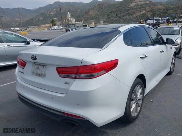 2017 Kia Optima EX with VIN 5XXGU4L38HG134961, listed as a IAAI auction lot 41976191 with 91,874 mi miles. Bid and sale history available at carsss.com. Image 4.