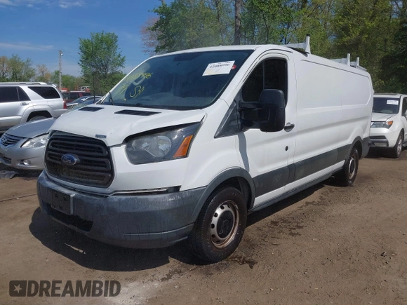 2015 Ford Transit with VIN 1FTNE2YM7FKB00894, listed as a IAAI auction lot 42088996 with 199,321 mi miles and . Bid and sale history available at DreamBid. Image 2.