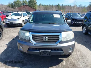 2009 Honda Pilot EX-L with VIN 5FNYF48669B044746, listed as a IAAI auction lot 41932721 with 137,070 mi miles and . Bid and sale history available at carsss.com. Image 12.
