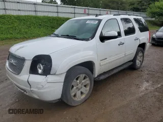 2011 GMC Yukon SLT z VIN 1GKS2CE00BR150352, wystawiony jako Copart lot #61031085 z przebiegiem 258 142 mil mil oraz Czysty tytuł • Clean title. Historia ofert i sprzedaży dostępna na DreamBid. Obrazek 1.