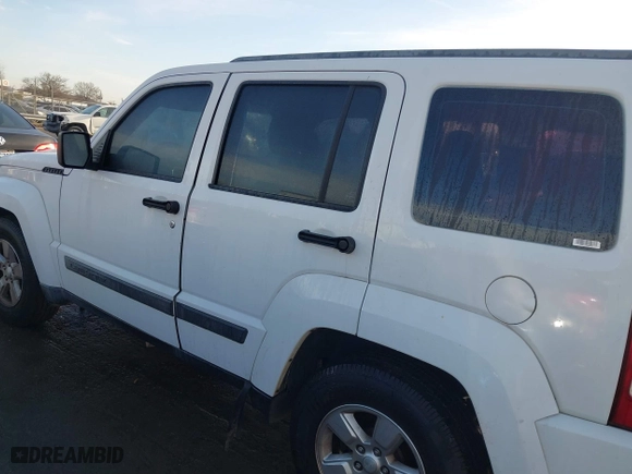 2011 Jeep Liberty Sport with VIN 1J4PP2GK7BW586705, listed as a IAAI auction lot 41110560 with 202,848 mi miles. Bid and sale history available at carsss.com. Image 14.