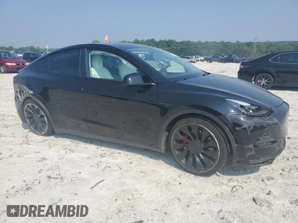 2022 Tesla Model Y Performance with VIN 7SAYGDEF5NF344292, listed as a Copart auction lot 59153775 with Not provided miles and Salvage title. Bid and sale history available at DreamBid. Image 4.