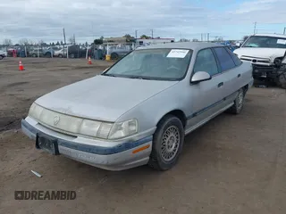1991 Mercury Sable z VIN 1MECM50U6MG615570, wystawiony jako IAAI lot #41742946 z przebiegiem 19 426 mil mil oraz . Historia ofert i sprzedaży dostępna na DreamBid. Obrazek 2.