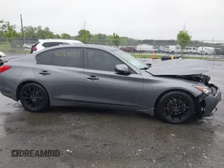 2015 Infiniti Q50 Premium with VIN JN1BV7APXFM358127, listed as a IAAI auction lot 42364173 with 97,512 mi miles and . Bid and sale history available at DreamBid. Image 13.