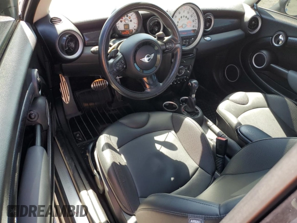 2012 MINI Hardtop S with VIN WMWSV3C57CTY16657, listed as a Copart auction lot 62812445 with 122,796 mi miles and Salvage title. Bid and sale history available at DreamBid. Image 8.