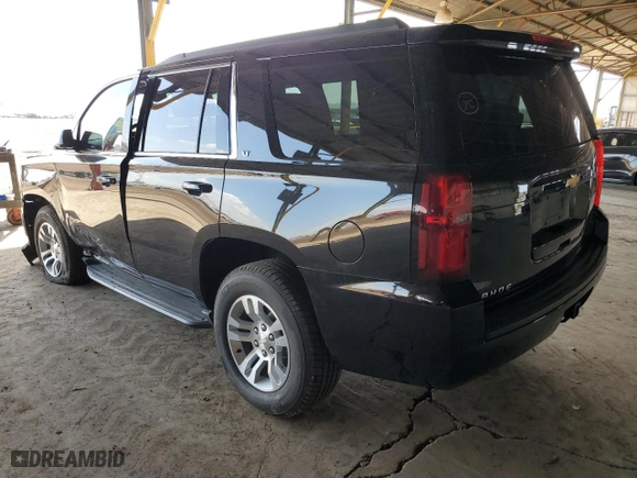 2019 Chevrolet Tahoe LT with VIN 1GNSKBKCXKR336038, listed as a Copart auction lot 50979795 with 81,359 mi miles and Salvage Title. Bid and sale history available at carsss.com. Image 2.