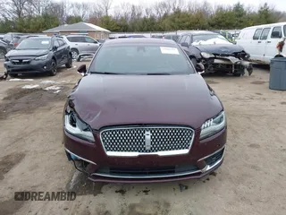 2017 Lincoln MKZ Select z VIN 3LN6L5CC3HR620854, wystawiony jako IAAI lot #41042376 z przebiegiem 131 517 mil mil oraz . Historia ofert i sprzedaży dostępna na DreamBid. Obrazek 12.