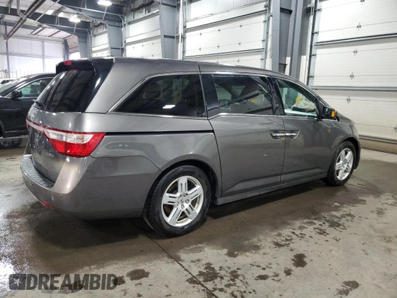 2013 Honda Odyssey Touring with VIN 5FNRL5H90DB071415, listed as a Copart auction lot 52697785 with 200,430 mi miles and Salvage Title. Bid and sale history available at carsss.com. Image 3.