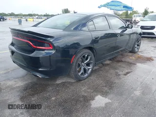 2020 Dodge Charger SXT z VIN 2C3CDXBG4LH238412, wystawiony jako IAAI lot #42494489 z przebiegiem 102 337 mil mil oraz . Historia ofert i sprzedaży dostępna na DreamBid. Obrazek 4.