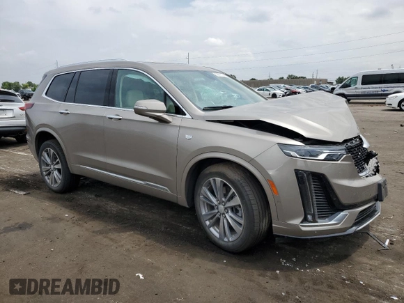 2022 Cadillac XT6 Premium Luxury with VIN 1GYKPDRS5NZ180296, listed as a Copart auction lot 59081184 with 21,380 mi miles and Salvage title. Bid and sale history available at DreamBid. Image 4.