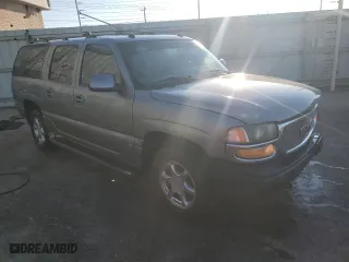 2005 GMC Yukon XL Denali with VIN 1GKFK66U65J151593, listed as a Copart auction lot 48551235 with 0 mi miles and Salvage Title. Bid and sale history available at carsss.com. Image 4.