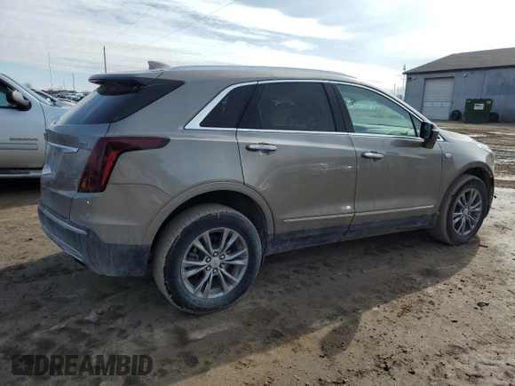 2022 Cadillac XT5 AWD Premium Luxury with VIN 1GYKNDRSXNZ121976, listed as a Copart auction lot 47200175 with 21,627 mi miles and Clean title. Bid and sale history available at DreamBid. Image 3.