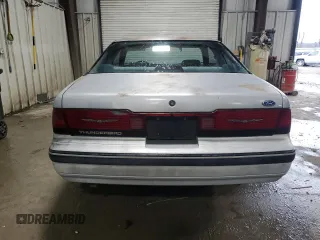 1990 Ford Thunderbird with VIN 1FAPP6047LH140817, listed as a Copart auction lot 83910194 with 177,909 mi miles and Salvage Title. Bid and sale history available at DreamBid. Image 6.