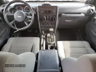 2007 Jeep Wrangler Unlimited Sahara with VIN 1J4GA59197L121262, listed as a Copart auction lot 61551685 with 233,309 mi miles and Clean title. Bid and sale history available at DreamBid. Image 8.