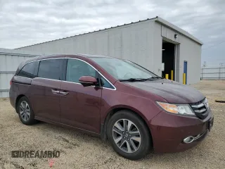 2016 Honda Odyssey Touring Elite with VIN 5FNRL5H9XGB109463, listed as a Copart auction lot 57483225 with 182,450 mi miles and Salvage title. Bid and sale history available at DreamBid. Image 4.