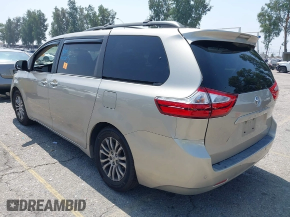 2015 Toyota Sienna XLE with VIN 5TDYK3DC4FS560743, listed as a IAAI auction lot 42488745 with 145,009 mi miles and . Bid and sale history available at DreamBid. Image 3.