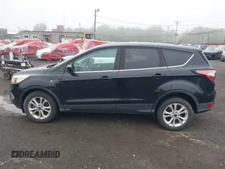 2017 Ford Escape SE with VIN 1FMCU9GD3HUD90154, listed as a IAAI auction lot 42181078 with 106,143 mi miles and . Bid and sale history available at DreamBid. Image 14.