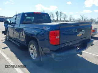 2017 Chevrolet Silverado 1500 LT with VIN 1GCVKREC6HZ312970, listed as a IAAI auction lot 41978950 with 104,239 mi miles and . Bid and sale history available at DreamBid. Image 3.