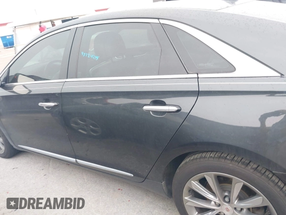 2014 Cadillac XTS z VIN 2G61L5S32E9326141, wystawiony jako IAAI lot #42300854 z przebiegiem 200 284 mil mil oraz . Historia ofert i sprzedaży dostępna na DreamBid. Obrazek 14.
