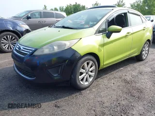 2011 Ford Fiesta SE z VIN 3FADP4BJ7BM122774, wystawiony jako IAAI lot #42392327 z przebiegiem 174 764 mil mil oraz . Historia ofert i sprzedaży dostępna na DreamBid. Obrazek 2.