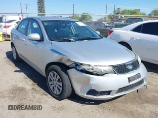 2010 Kia Forte EX with VIN KNAFU4A2XA5097831, listed as a IAAI auction lot 41872156 with 168,081 mi miles. Bid and sale history available at carsss.com. Image 1.