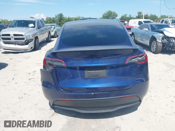 2023 Tesla Model Y Performance with VIN 7SAYGDEF9PF582908, listed as a IAAI auction lot 41930957 with 52,857 mi miles and . Bid and sale history available at DreamBid. Image 15.