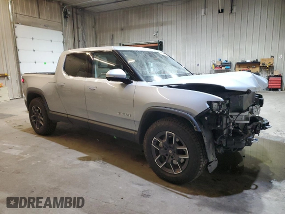 2024 Rivian R1T Adventure z VIN 7FCTGCAA0RN030370, wystawiony jako Copart lot #87251784 z przebiegiem 11 549 mil mil oraz Szkody całkowita. Historia ofert i sprzedaży dostępna na DreamBid. Obrazek 4.