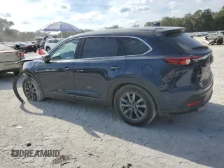 2020 Mazda CX-9 Touring with VIN JM3TCACY0L0421773, listed as a Copart auction lot 58373945 with 106,698 mi miles and Non repairable. Bid and sale history available at DreamBid. Image 2.