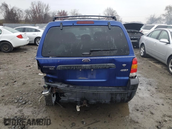 2005 Ford Escape XLT with VIN 1FMYU93165KD64012, listed as a Copart auction lot 77696623 with 144,630 mi miles and Non Repairable. Bid and sale history available at carsss.com. Image 6.