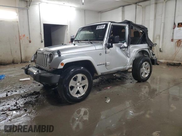 2009 Jeep Wrangler Sahara z VIN 1J4FA54189L789642, wystawiony jako Copart lot #89078145 z przebiegiem 128 902 mil mil oraz Szkoda całkowita • Salvage title. Historia ofert i sprzedaży dostępna na DreamBid. Obrazek 1.