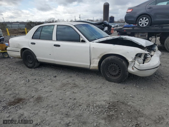 1999 Ford Crown Victoria Police Pkg with VIN 2FAFP71W6XX107511, listed as a Copart auction lot 44328975 with 188,433 mi miles and Salvage Title. Bid and sale history available at carsss.com. Image 4.