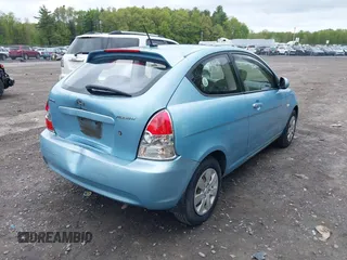 2010 Hyundai Accent GS with VIN KMHCM3AC2AU180440, listed as a IAAI auction lot 42156900 with 114,984 mi miles and . Bid and sale history available at DreamBid. Image 6.