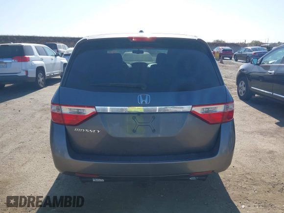 2012 Honda Odyssey EX-L with VIN 5FNRL5H6XCB061026, listed as a IAAI auction lot 42574612 with 144,480 mi miles and . Bid and sale history available at DreamBid. Image 16.