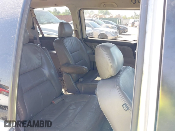 2002 Honda Odyssey EX-L z VIN 5FNRL18062B011890, wystawiony jako IAAI lot #41972294 z przebiegiem 245 889 mil mil oraz . Historia ofert i sprzedaży dostępna na DreamBid. Obrazek 8.