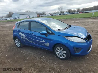 2011 Ford Fiesta SE with VIN 3FADP4EJ6BM228323, listed as a Copart auction lot 53001145 with 174,776 mi miles and Salvage Title. Bid and sale history available at carsss.com. Image 4.