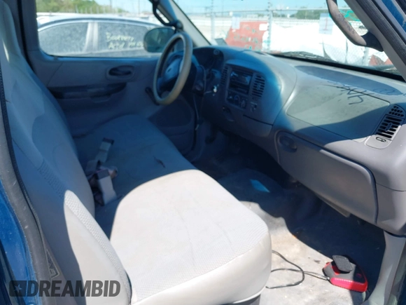 2000 Ford F-150 XL with VIN 3FTZF1722YMA80722, listed as a IAAI auction lot 40449042 with 205,576 mi miles and . Bid and sale history available at DreamBid. Image 5.