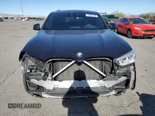 2021 BMW X4 M40i with VIN 5UX2V5C06M9E04443, listed as a Copart auction lot 72061194 with 71,637 mi miles and Salvage title. Bid and sale history available at DreamBid. Image 5.